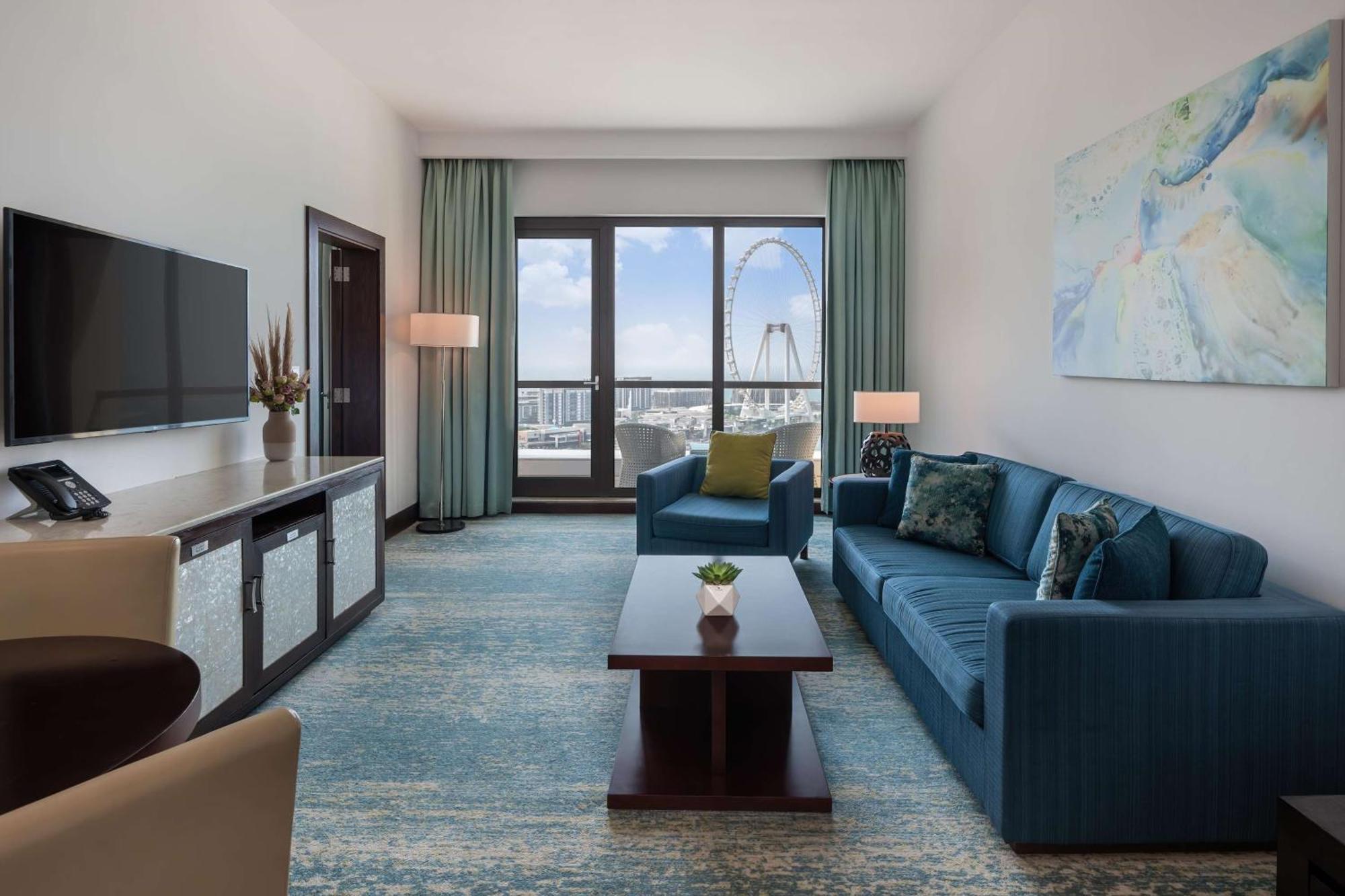 جيه ايه فندق أوشن فيو دبي المظهر الخارجي الصورة A living room at the Four Seasons